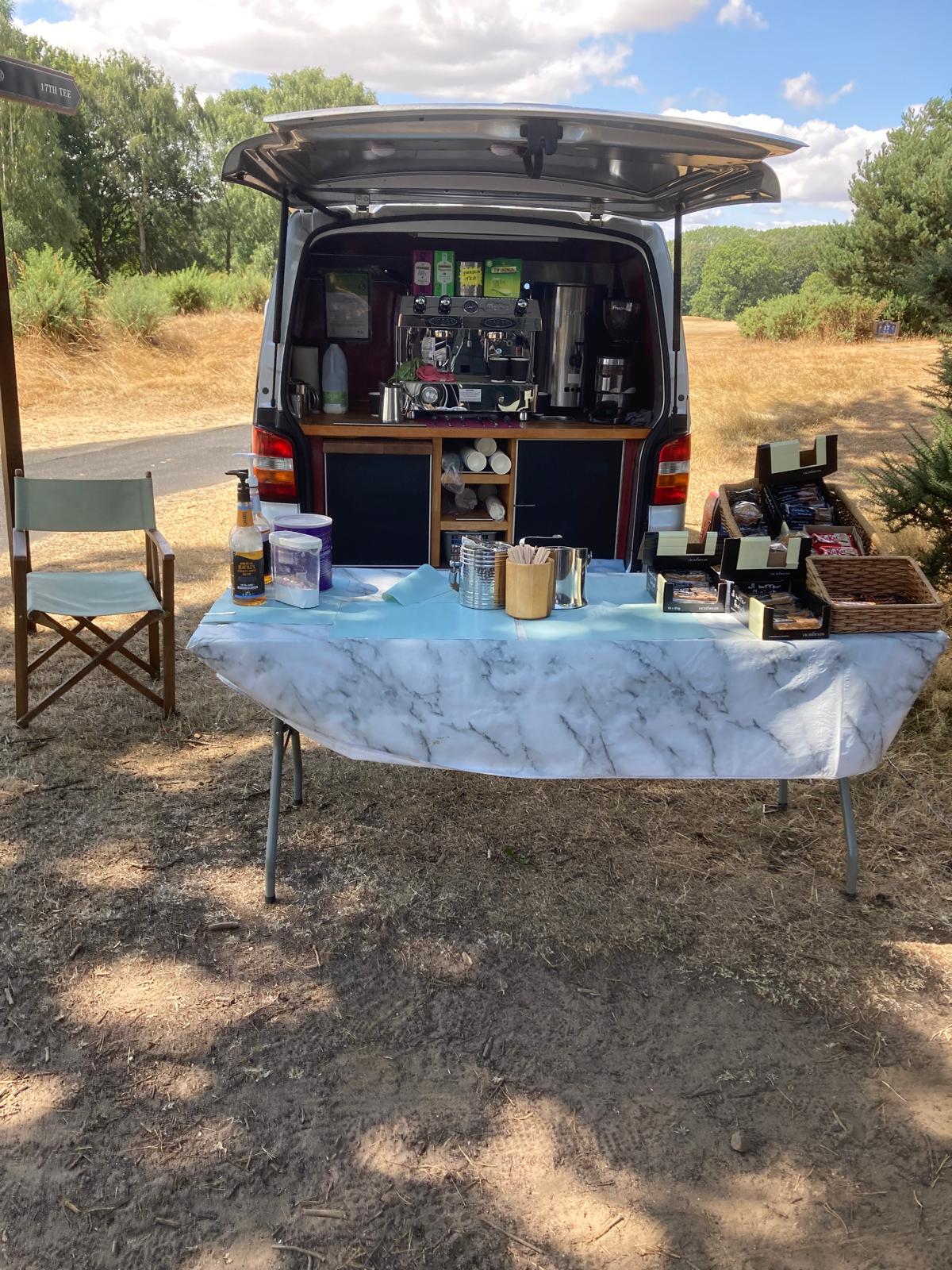 Recent Coffee Cab outdoor counter with cakes and drinks